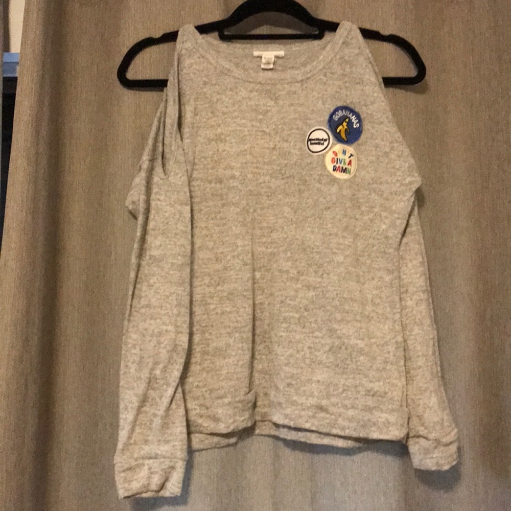 Sweater peek hole shoulders